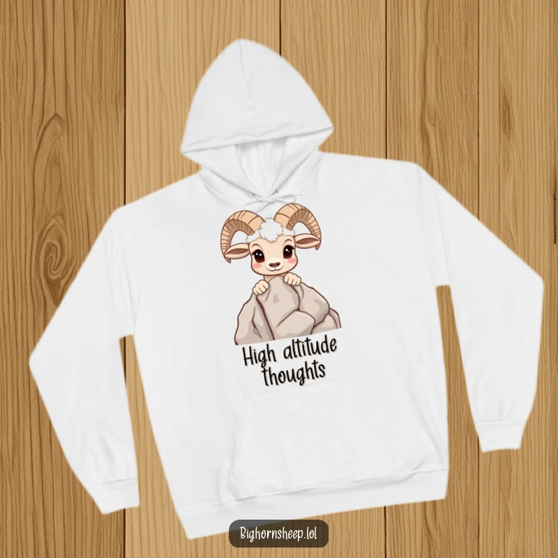 Funny hoodie design showing a curious bighorn sheep peeking over a rocky mountain outcrop with an interested gaze.