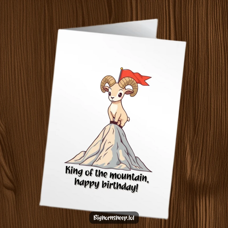 Funny Free Printable Birthday Card: Bighorn sheep triumphantly standing on a mountain peak, planting a flag, symbolizing birthday success.