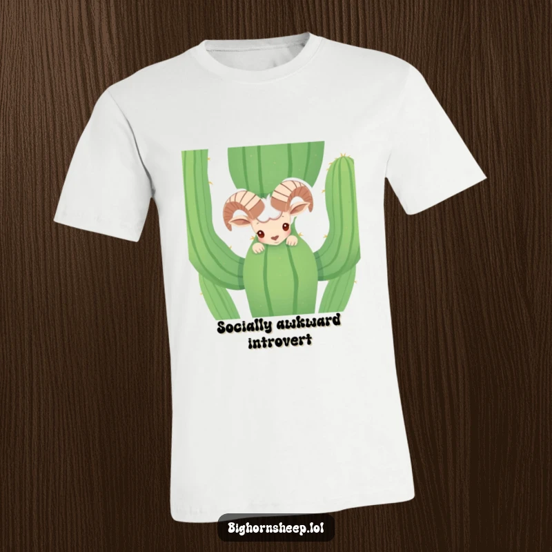 Funny shy bighorn sheep peeking comically from behind a large cactus on a t-shirt. A desert-themed humorous apparel choice.